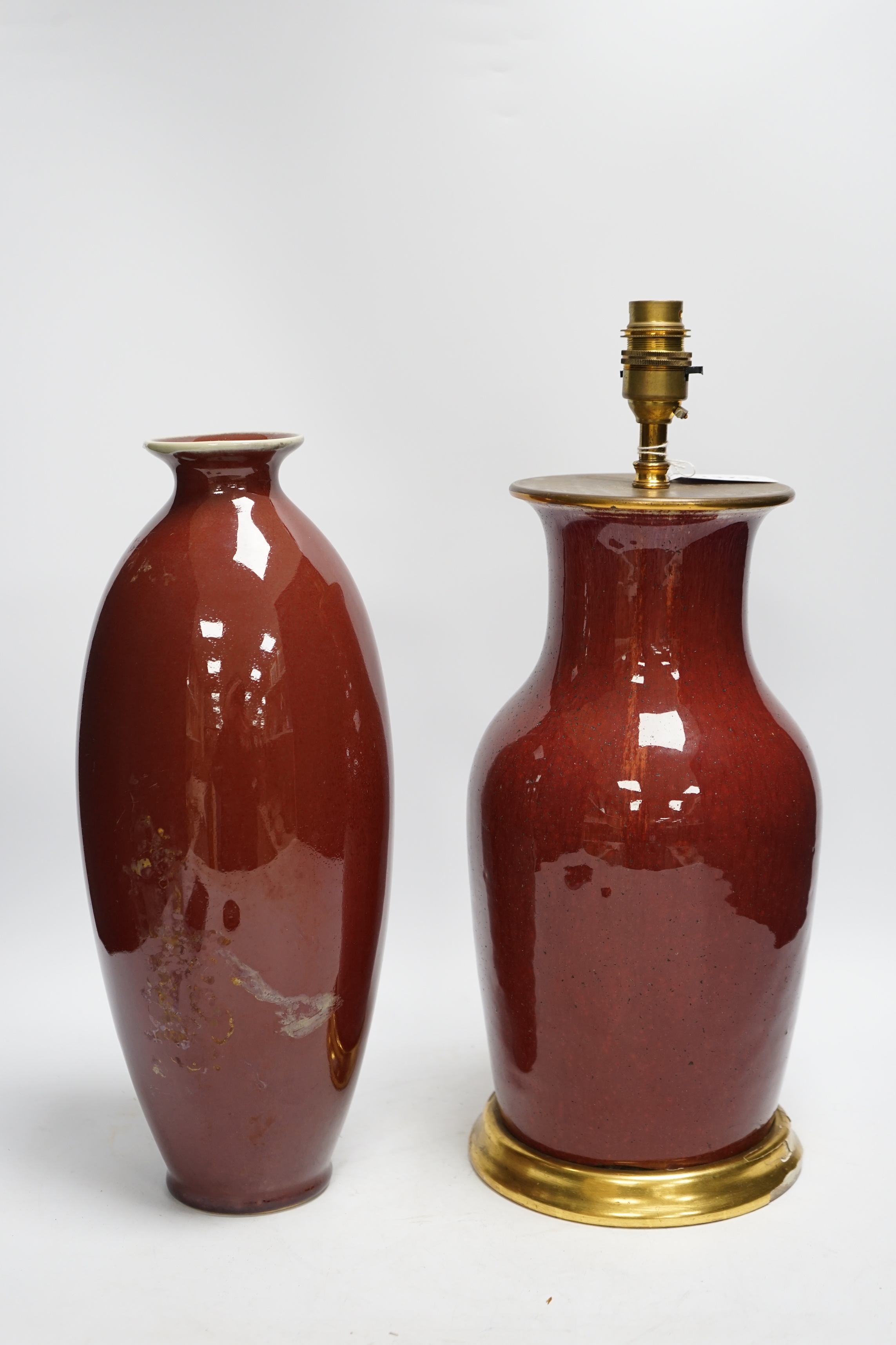 Two Chinese sang-de-boeuf vases, one mounted as a lamp, tallest 40cm total